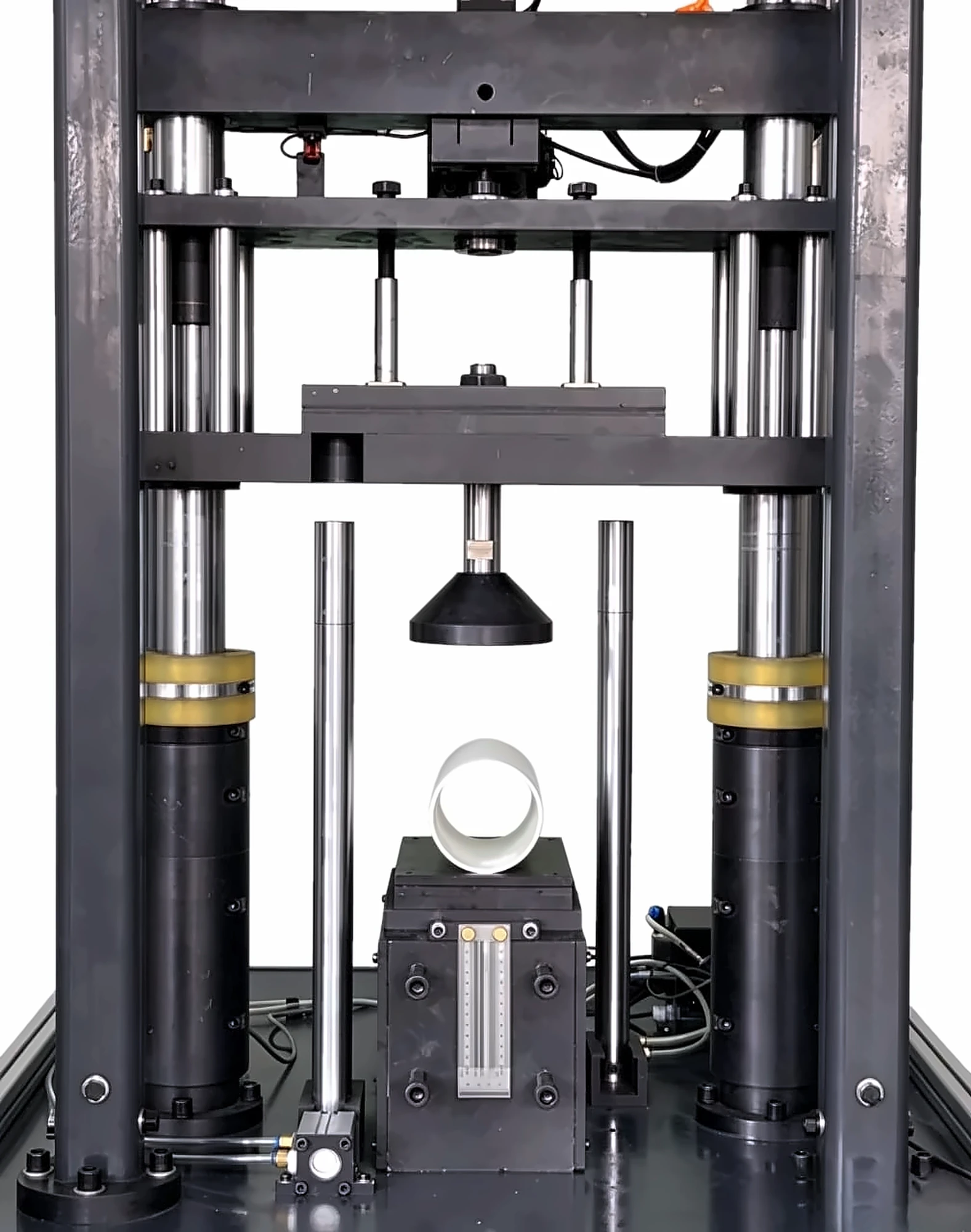 DWT-1800 with the 6 in. round hammer above a PVC pipe specimen on the sample seat