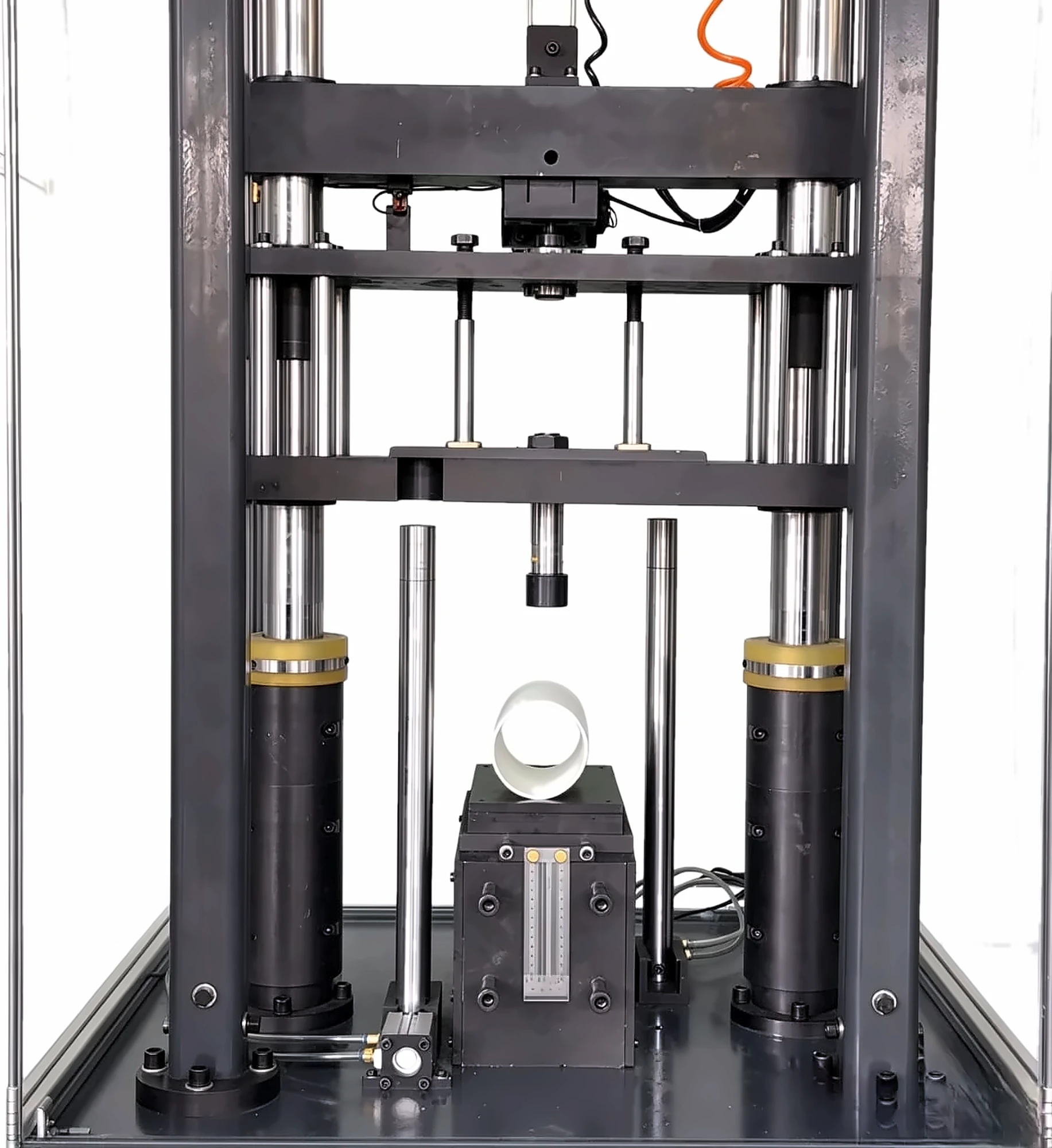DWT-1800 drop weight impact tester, front view of the frame with a PVC pipe specimen on the sample seat